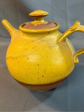 Good Earth Rodney Lemonier Signed handcrafted, teapot pottery, yellow brown.